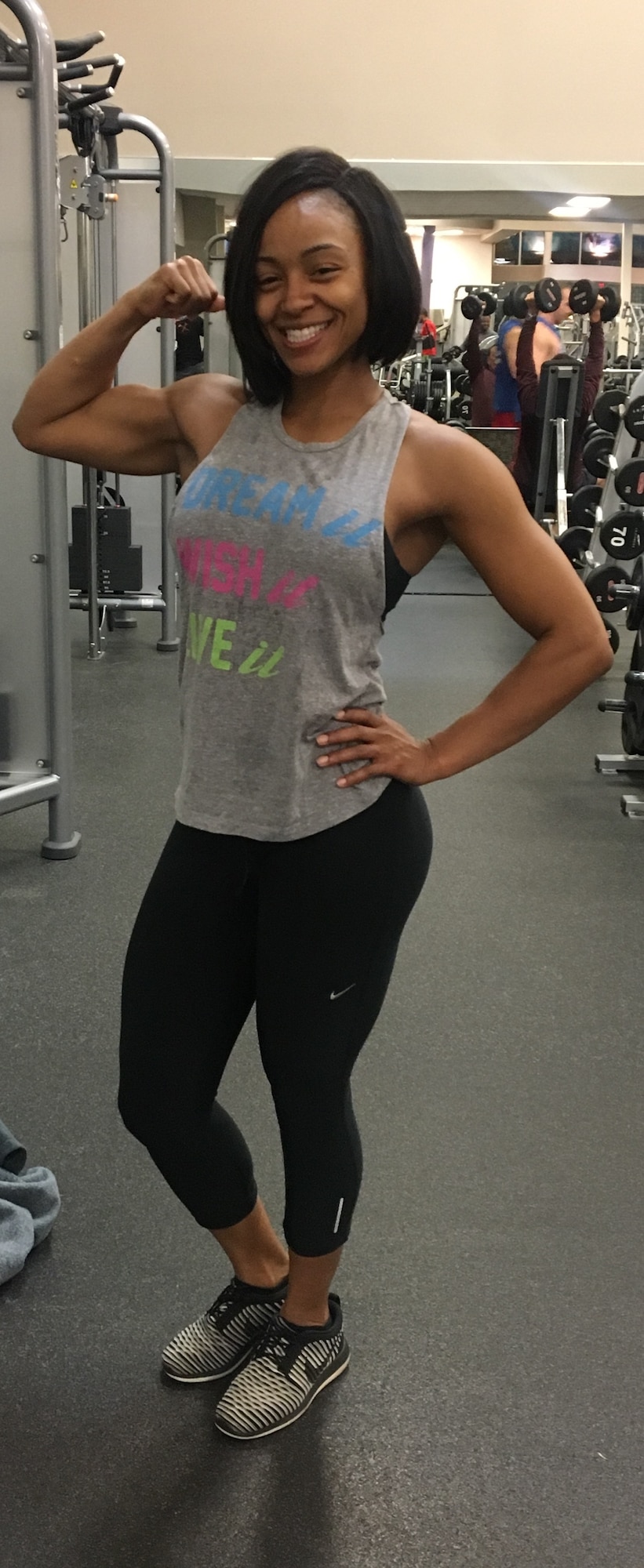 2nd Lt. Wendy Price, 88th Mission Support Group executive officer poses in the gym where she trains for bodybuilding competitions Oct. 17, 2018. Price began competing this year and has taken home four wins, ranging from first place to fifth place. (Courtesy photo)