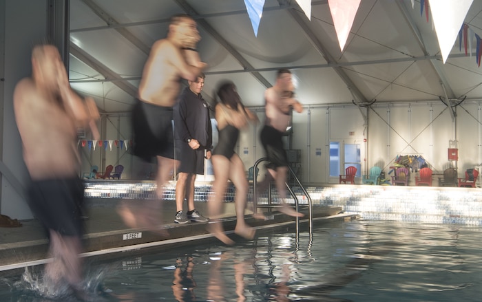 Sailors demonstrate a deep water dive during a second-class swim qualification test Oct. 19, 2018, at the Danny Jones Recreational Center, North Charleston, S.C.