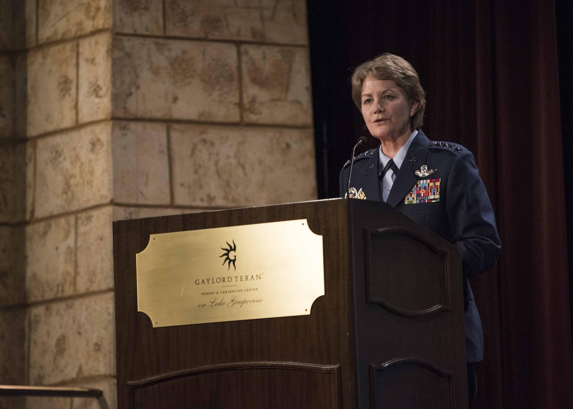 Gen. Maryanne Miller, Air Mobility Command commander, introduces the Secretary of the Air Force Heather Wilson at the Airlift/Tanker Association Symposium in Grapevine, Texas, Oct. 25, 2018. A/TA provides mobility Airmen a professional development forum to  engage with industry experts within the mobility enterprise, attend seminars focused on mobility priorities, and listen to leadership perspectives from top leaders in the Air Force and Department of Defense.     (U.S. Air Force photo by Tech. Sgt. Jodi Martinez)