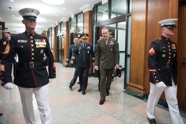 U.S. Chairman of the Joint Chiefs of Staff Gen. Joe Dunford speaks with his counterpart Chairman of the Republic of Korea Joint Chiefs of Staff Gen. Park Han-Ki as they head to multilateral meetings between U.S., Republic of Korean, and Japanese military officials at the Pentagon, Oct. 26, 2018.