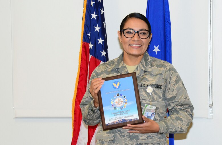 Airman 1st Class Dalia Cervantes, 377th Medical Group, received the First Sergeants Diamond Sharp Award here Oct. 25. The award is given for exceptional professionalism and contribution to the mission. (U.S. Air Force photo by Jessie Perkins)