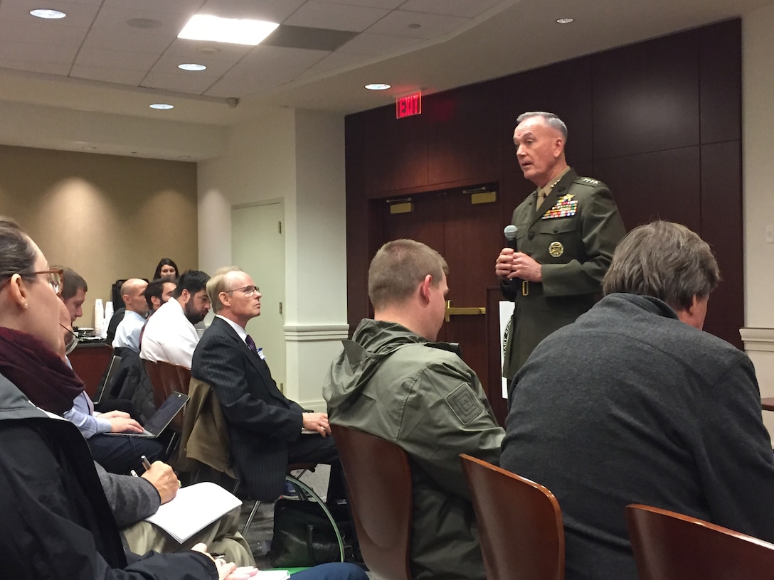 Marine Corps Gen. Joe Dunford, the chairman of the Joint Chiefs of Staff, describes the global strategic environment during a presentation at the Military Reporters and Editors Conference in Arlington, Va., Oct. 26, 2018. DOD photo by Jim Garamone