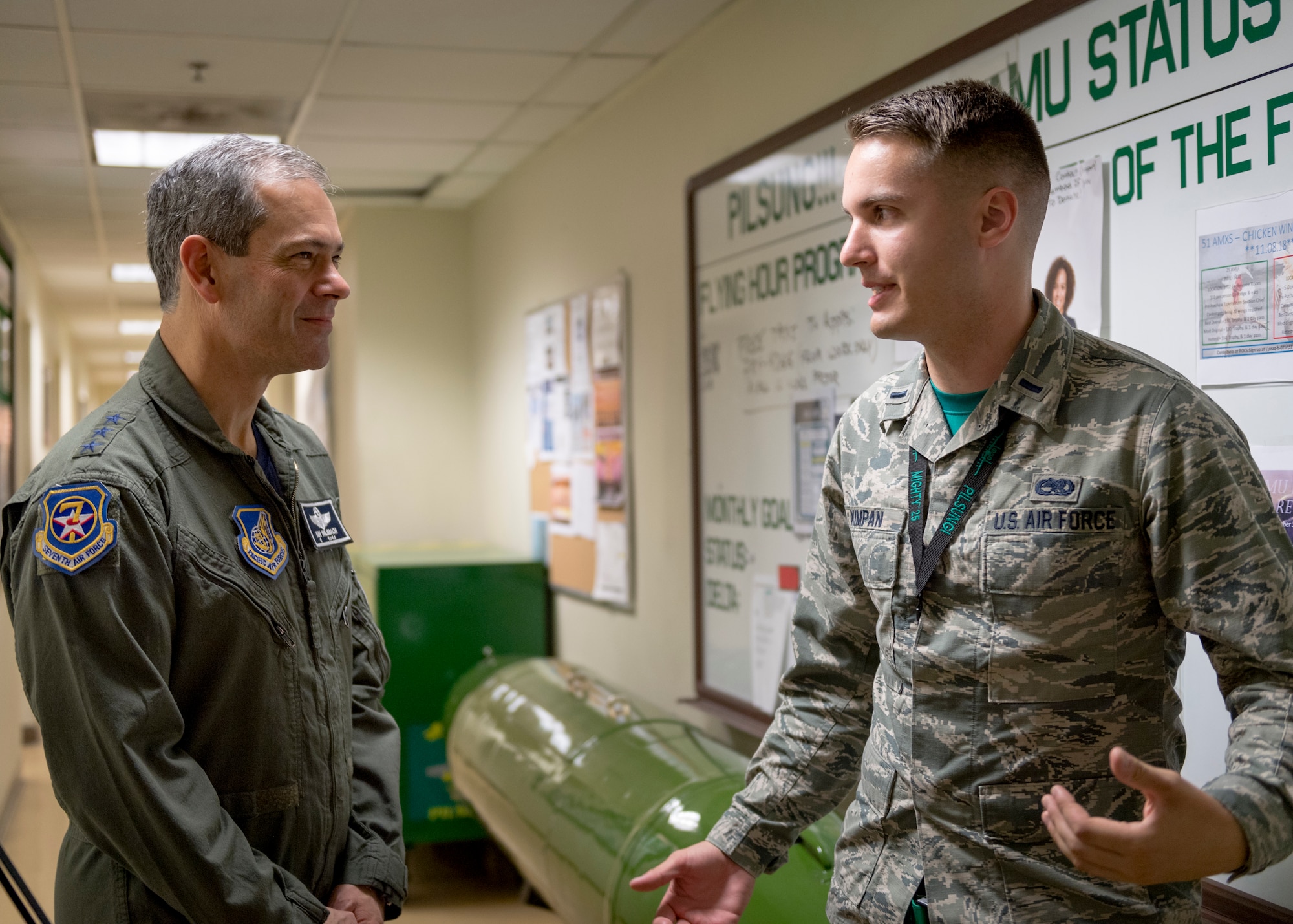 U.S. Air Force 1st Lt. Samuel Kimpan, right, 51st Aircraft Maintenance Squadron assistant officer in charge, briefs Lt. Gen. Kenneth Wilsbach, Seventh Air Force commander, on maintenance operations and procedures at Osan Air Base, Republic of Korea, Oct. 26, 2018.  The 51st AMXS was one of several stops as part of Wilsbach’s immersion tour of the 51st Operations and Maintenance Groups as the new 7th AF commander.  (U.S. Air Force photo by Staff Sgt. Rachel Maxwell)