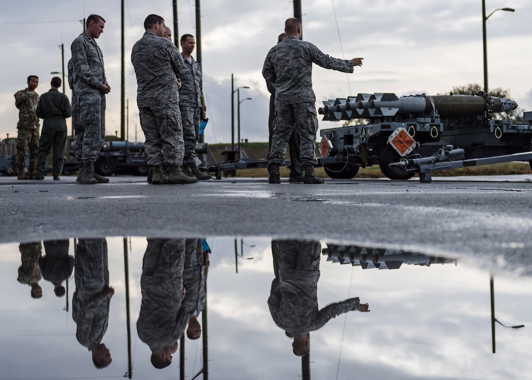 Personnel assigned to the 51st Munitions Squadron briefs Lt. Gen. Kenneth Wilsbach, Seventh Air Force commander, on the various munitions assigned to the unit during an immersion tour at Osan Air Base, Republic of Korea, Oct. 26, 2018.  As the new 7th AF commander, Wilsbach toured various units around Osan Air Base to include 51st MUNS.  (U.S. Air Force photo by Staff Sgt. Rachel Maxwell)