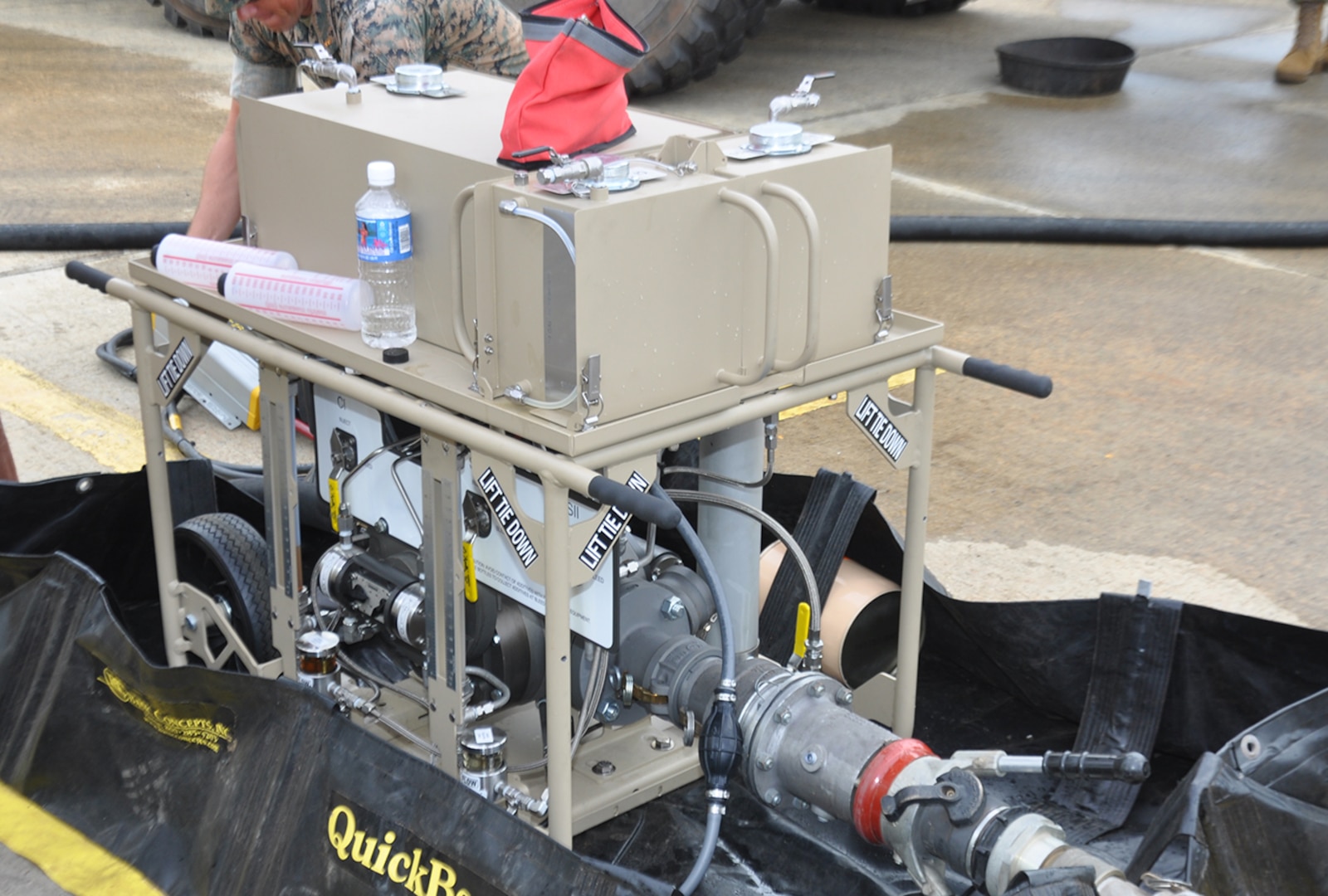 The Marine Corps Expeditionary Mobile Fuel Additization Capability prototype system is the Hammonds Model TPI-3T-3A Portable Fluid Powered Additive Injector. It is a small, easy to use, two-man carry system.