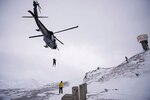 Col. Harlie Bodine, commander of the 611th Air and Space Operations Center, U.S. Air Force, spent the day with the 176th Wing, Alaska Air National Guard’s rescue squadrons during an immersion flight, Nov. 24,2015, in and around the JBER area. The day’s demonstrations included an air refueling mission in which an HH-60G Pave Hawk helicopter was refueled by an HC-130 King aircraft, as well as a hoist extraction demo from a Pave Hawk. A Pave Hawk crew rescued an injured snowmobiler on Saturday.