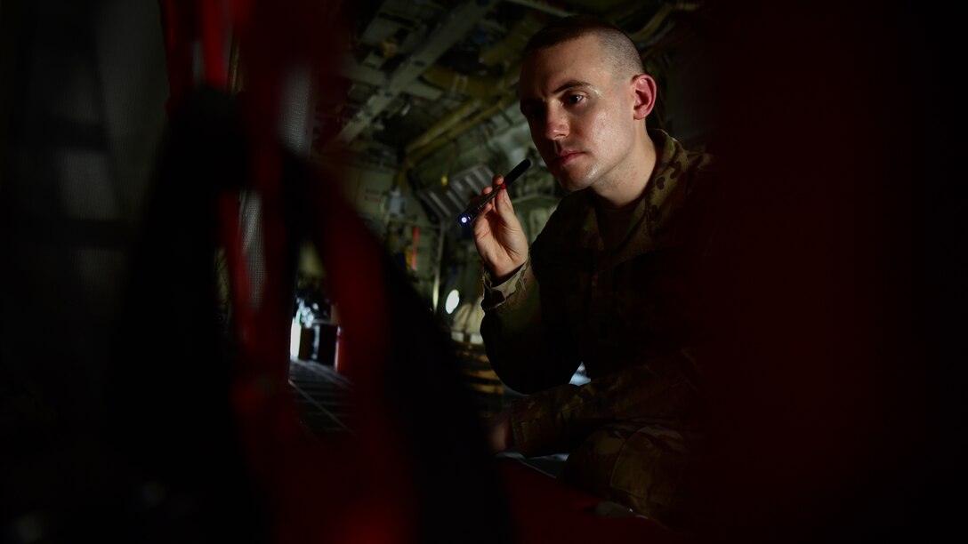 U.S. Air Force 1st. Lt. Collin Dart, 386th Expeditionary Maintenance Group depot liaison engineer, inspects the internals of a C-130 Hercules aircraft Oct. 17, 2018, at an undisclosed location in Southwest Asia. As a member of the Joint Combat Assessment Team, Dart evaluates aviation combat damage incidents, assesses the threat environment for operational commanders, and collects data to support aircraft survivability research and development. (U.S. Air Force photo by Staff Sgt. Christopher Stoltz)