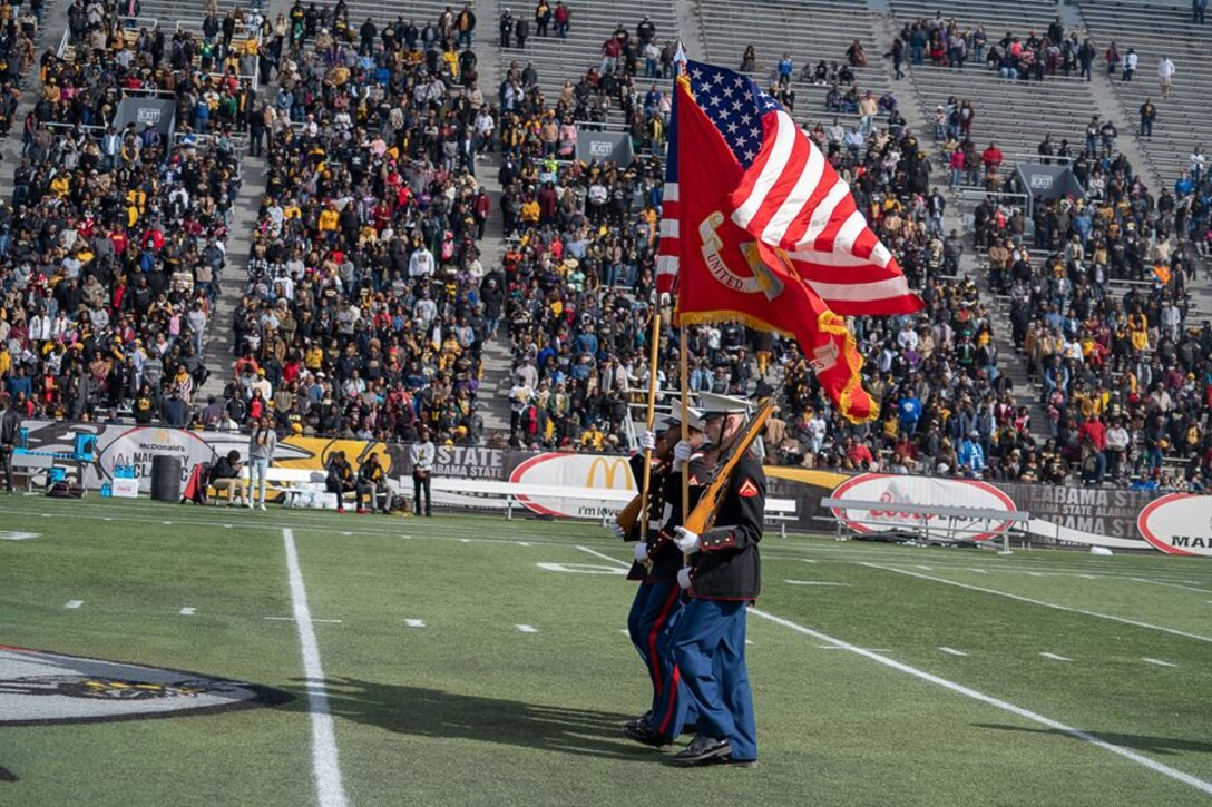Marines with 4th Combat Engineer Battalion, 4th Marine Division out of Bessemer, Alabama, conduct the color guard during the national anthem performed by world-renowned saxophonist Mike Phillips at the 77th annual Magic City Classic, Oct. 27, 2018. Participating in this presitigious HBCU classic not only fosters positive relationships within the community, but allows Marines and event goers to draw a parallel between the indelible fighting spirit and resolve to win of the Marines, and of the athletes who competed in the classic.
(Marine Corps photo by Cpl. Krista James/Released)