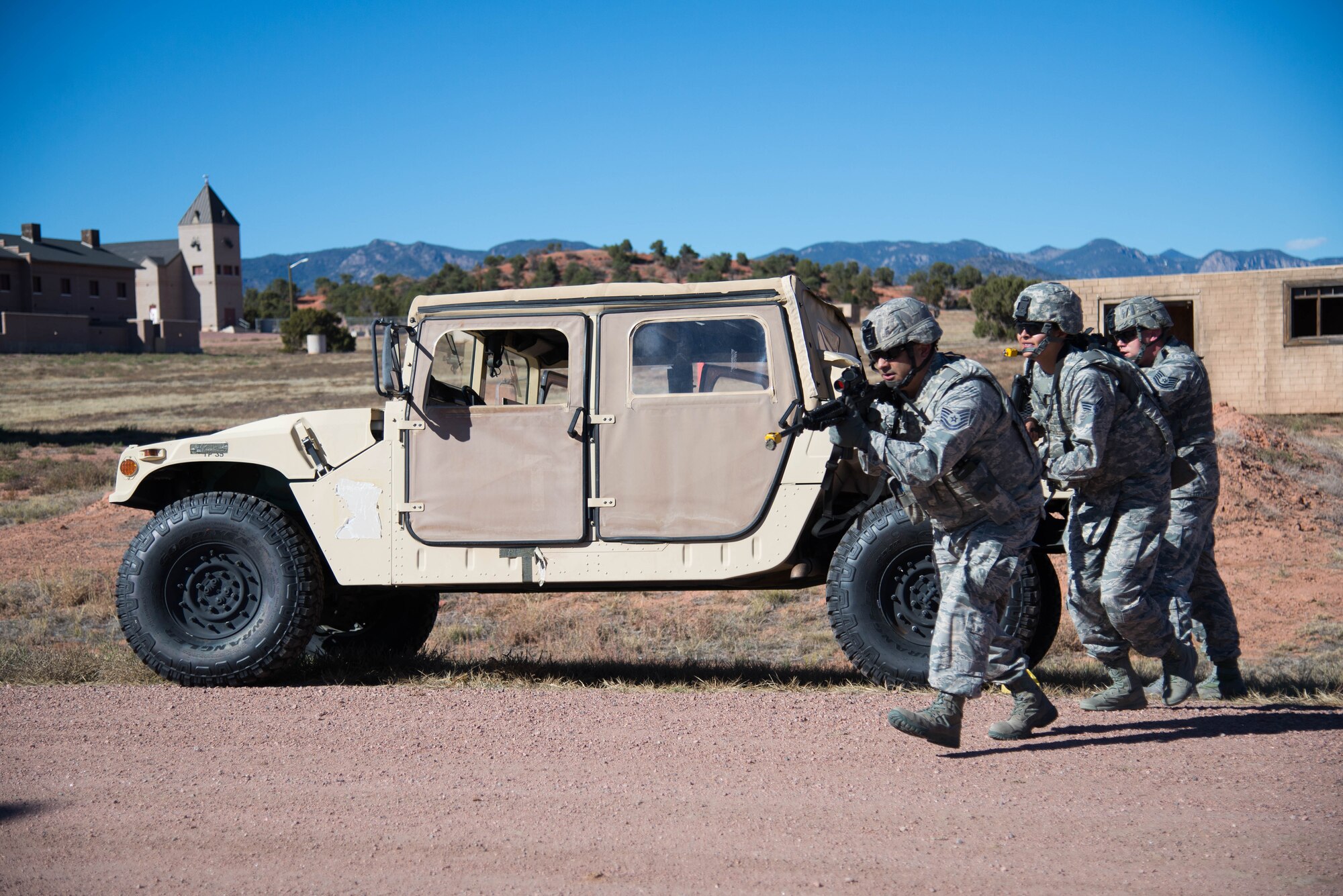 Reserve Citizen Airmen assigned to the 302nd Security Forces Squadron prepare to engage with opposing forces during a training exercise, Oct. 14, 2018, at Fort Carson, Colorado.