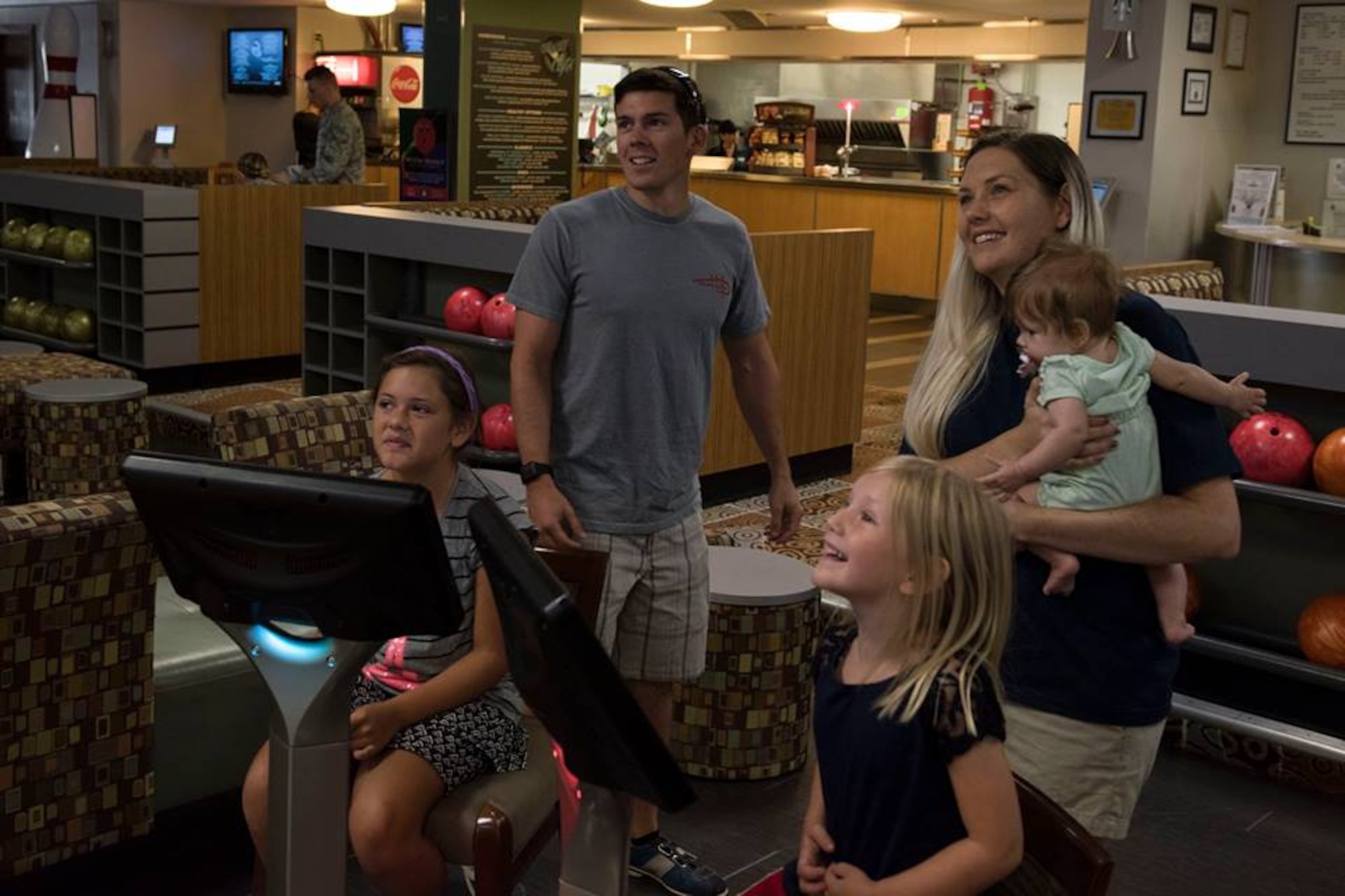 1st Lt. Adam Kriete, 307th Air Control Squadron student, and his family spend time with one another at Patrick Air Force Base, Fla. Oct. 18, 2018, after being displaced from their home at Tyndall Air Force Base, Fla. due to Hurricane Michael. In the aftermath of Hurricane Michael, the Krietes relied on the Air Force and each other to overcome adversity.