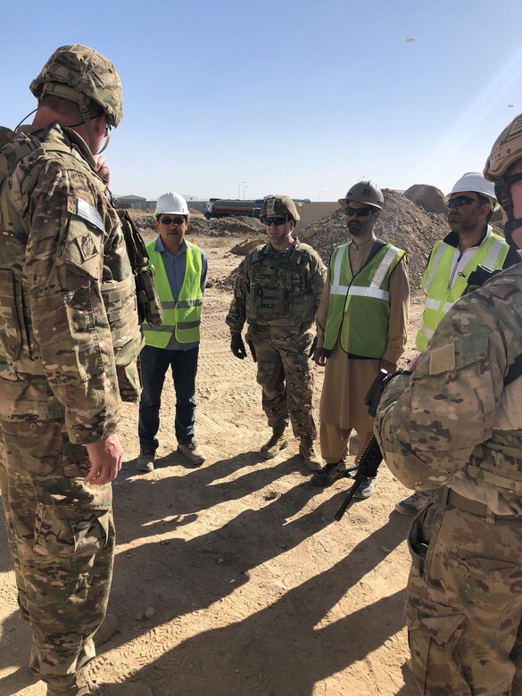 USACE Afghanistan personnel and the Contractor discuss the Well Site project schedule.
