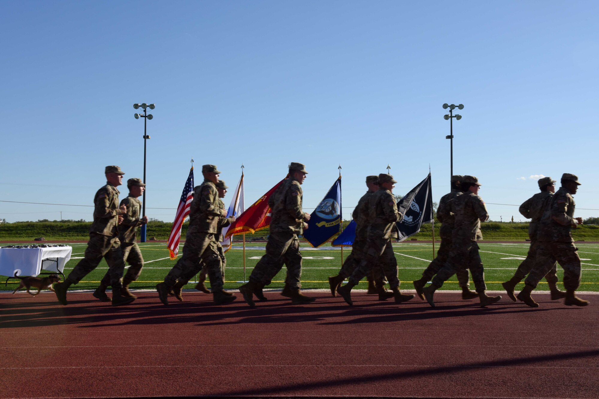 Soldiers from Goodfellow Air Force Base run during the 24-hour Prisoners of War and Missing in Action Vigil at the track on Goodfellow AFB, Texas, Oct. 27, 2018. Members from the base and San Angelo participated in the run to honor past and present prisoners of war and military members missing in action. (U.S. Air Force photo by Senior Airman Randall Moose/Released)