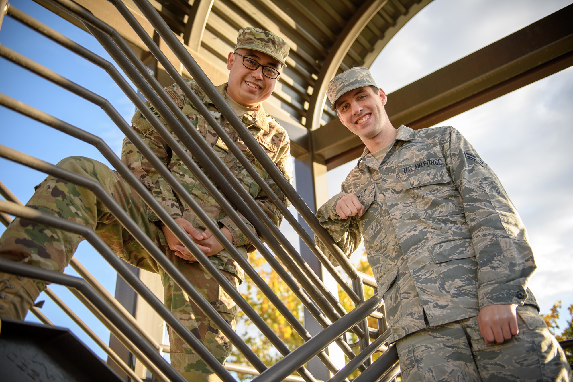 Airman 1st Class Christian Uy, left, and Airman 1st Class Andrew Snively pose for a photo on Oct. 29, 2018 at Hill Air Force Base, Utah. Uy and Snively both held successfull entry-level finance jobs before deciding to join the Air Force in 2017. They are two of the most financially experienced E-3s you're likely to run across in the military. (U.S. Air Force photo by R. Nial Bradshaw)