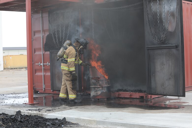Dozens of firefighters aboard Marine Corps Logistics Base Albany got a chance to build some critical skills thanks to a new live fire structural trainer, October 25. The installation recently purchased the structural trainer; the original cement structure was condemned 10 years ago. (U.S. Marine Corps photo by Re-Essa Buckels)