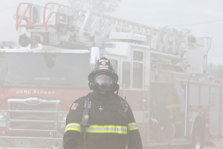 Dozens of firefighters aboard Marine Corps Logistics Base Albany got a chance to build some critical skills thanks to a new live fire structural trainer, October 25. The installation recently purchased the structural trainer; the original cement structure was condemned 10 years ago. (U.S. Marine Corps photo by Re-Essa Buckels)