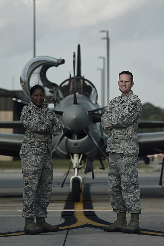 Senior Master Sgt. Scott Lopez, the maintenance superintendent for the 476th Maintenance Squadron at Moody Air Force Base, Ga., and Tech. Sgt. Lauren Camarena, an electrical and environmental systems craftsman with the 476 MXS, pose with an A-29 Super Tucano October 25, 2018, at Moody AFB.