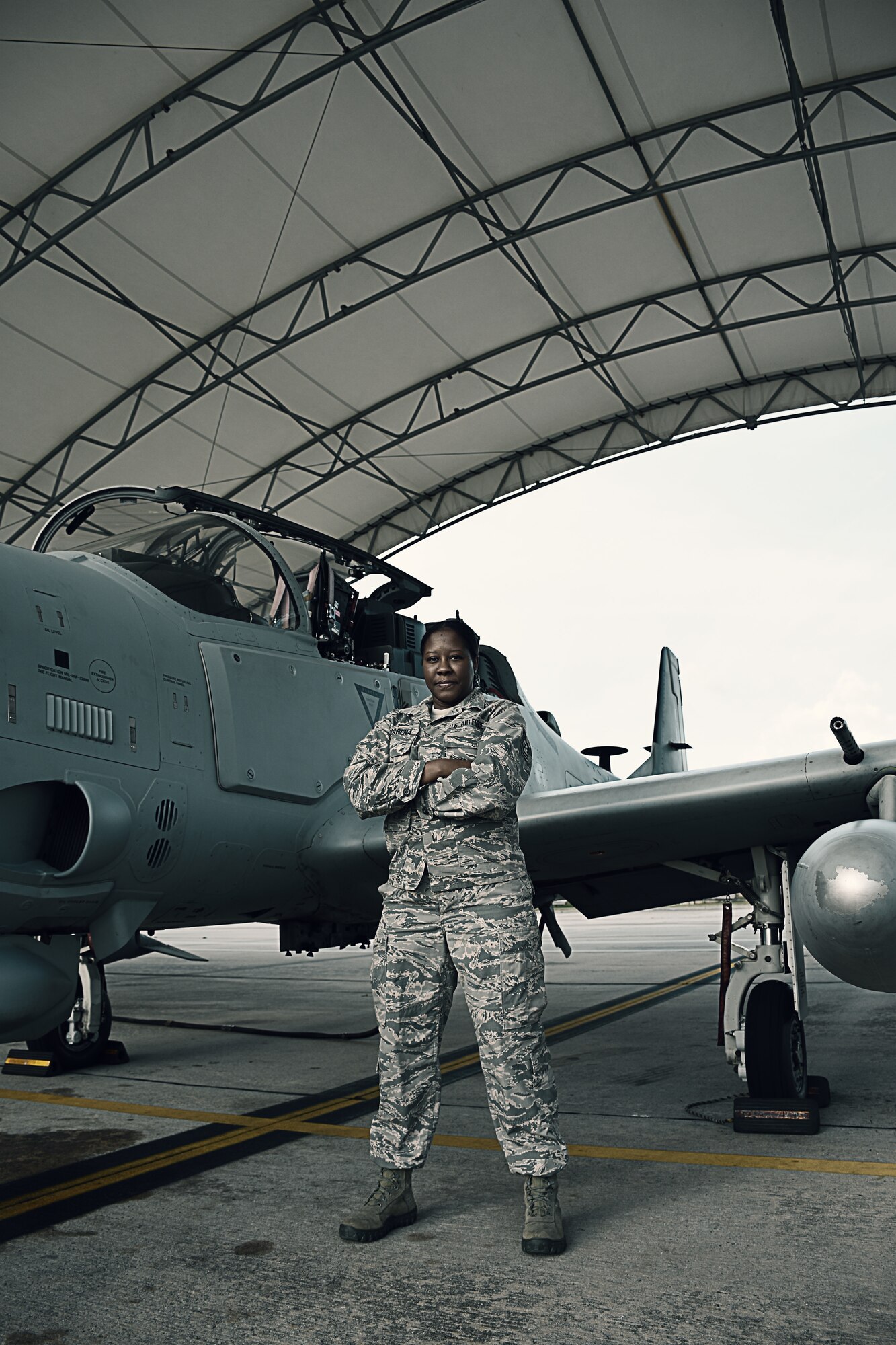 Senior Master Sgt. Scott Lopez, the maintenance superintendent for the 476th Maintenance Squadron at Moody Air Force Base, Ga., and Tech. Sgt. Lauren Camarena, an electrical and environmental systems craftsman with the 476 MXS, pose with an A-29 Super Tucano October 25, 2018, at Moody AFB.