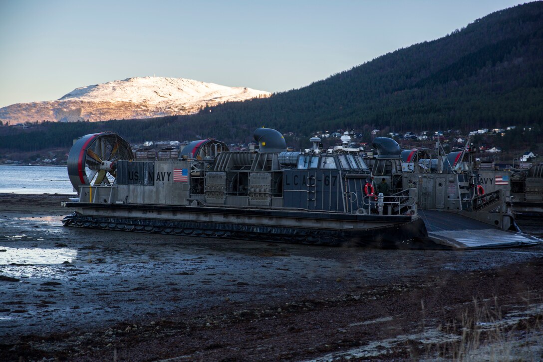 A Landing Craft Air Cushion offloads cargo and personnel during an amphibious landing in support of Trident Juncture 18 on Alvund Beach, Norway, Oct. 29, 2018. Trident Juncture provides a unique environment for the Marines and Sailors to rehearse their amphibious capabilities. The LCACs originated from USS Iwo Jima and showcased the ability of the Iwo Jima Amphibious Ready Group and the 24th Marine Expeditionary Unit to rapidly project combat power ashore. (U.S. Marine Corps photo by Lance Cpl. Margaret Gale)