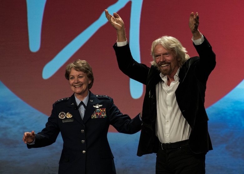 Gen. Maryanne Miller, Air Mobility Command Commander, welcomes Sir Richard Branson, founder of Virgin Records, innovator and philanthropist, to the stage during her
closing address at the Airlift/Tanker Association Symposium in Grapevine, Texas, Oct. 25, 2018.
Branson offered insight into how to develop a culture of innovation and stimulate active involvement across an organization. A/TA, AMC's premier professional development event, provides mobility Airmen an opportunity to learn about and discuss mobility priorities, issues, challenges, and successes. The venue creates dialogue between industry experts, the Air Force and Department of Defense about ways to innovate, enhance mission effects and advance readiness headed into the
future. (U.S. Air Force photo by Tech. Sgt. Jodi Martinez)