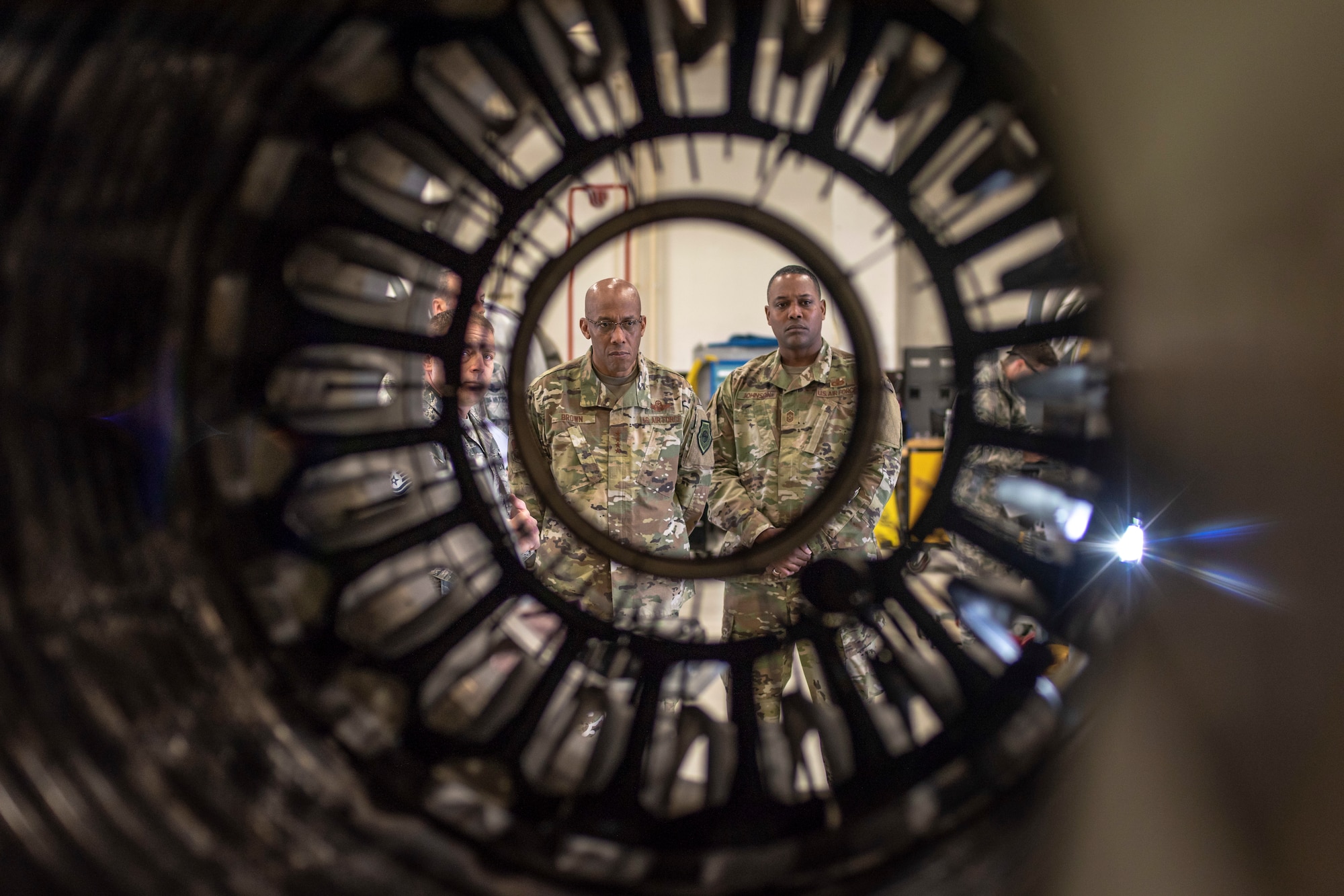 Gen. CQ Brown, Jr., Pacific Air Forces commander, and Chief Master Sgt. Anthony Johnson, PACAF command chief, listen as the 35th Maintenance Squadron jet engine intermediate maintenance section chief explains the important role the centralized engine repair facility plays in the 35th Maintenance Group’s mission during their tour of the installation at Misawa Air Base, Japan, Oct. 25, 2018. Brown visited with Airmen across the installation in his first visit to Misawa since taking command this past summer. He encouraged Airmen to step up and share their innovative ideas as the command works together to be ready, resilient and postured for the future. (U.S. Air Force photo by Tech. Sgt. Benjamin W. Stratton)