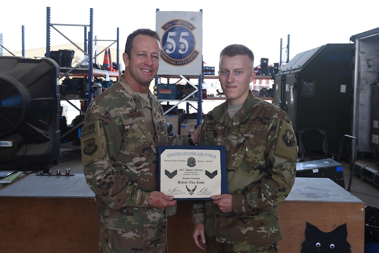 Airmen from the 407th AEG give Brig. Gen. Iverson a tour of the base.