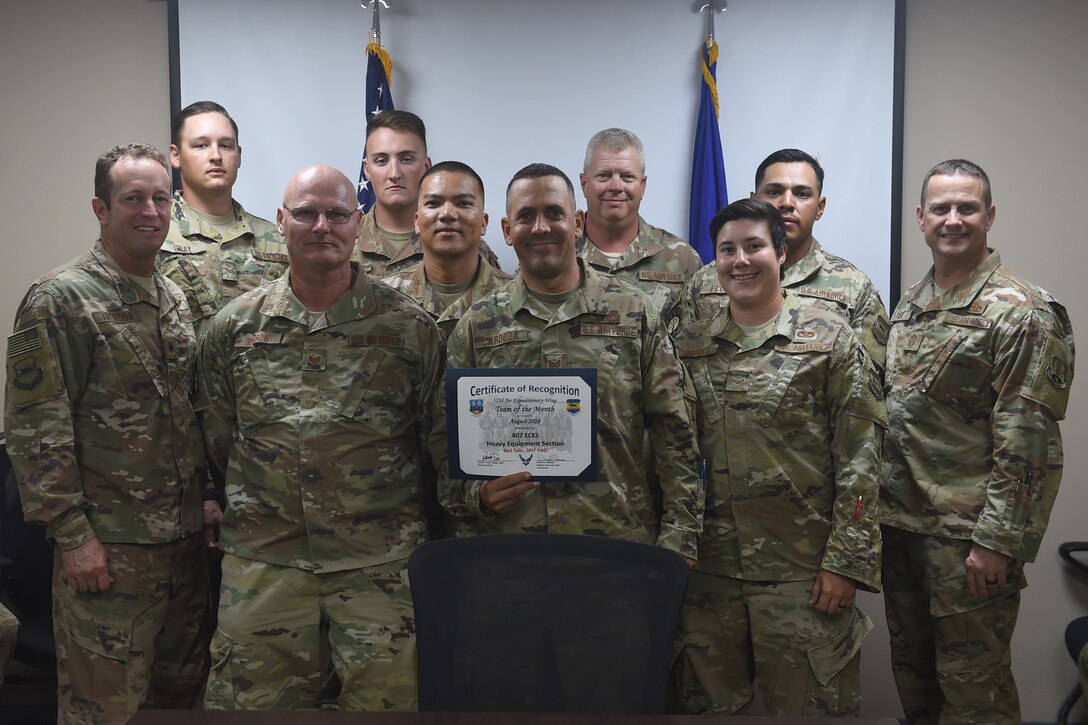 Airmen from the 407th AEG give Brig. Gen. Iverson a tour of the base.