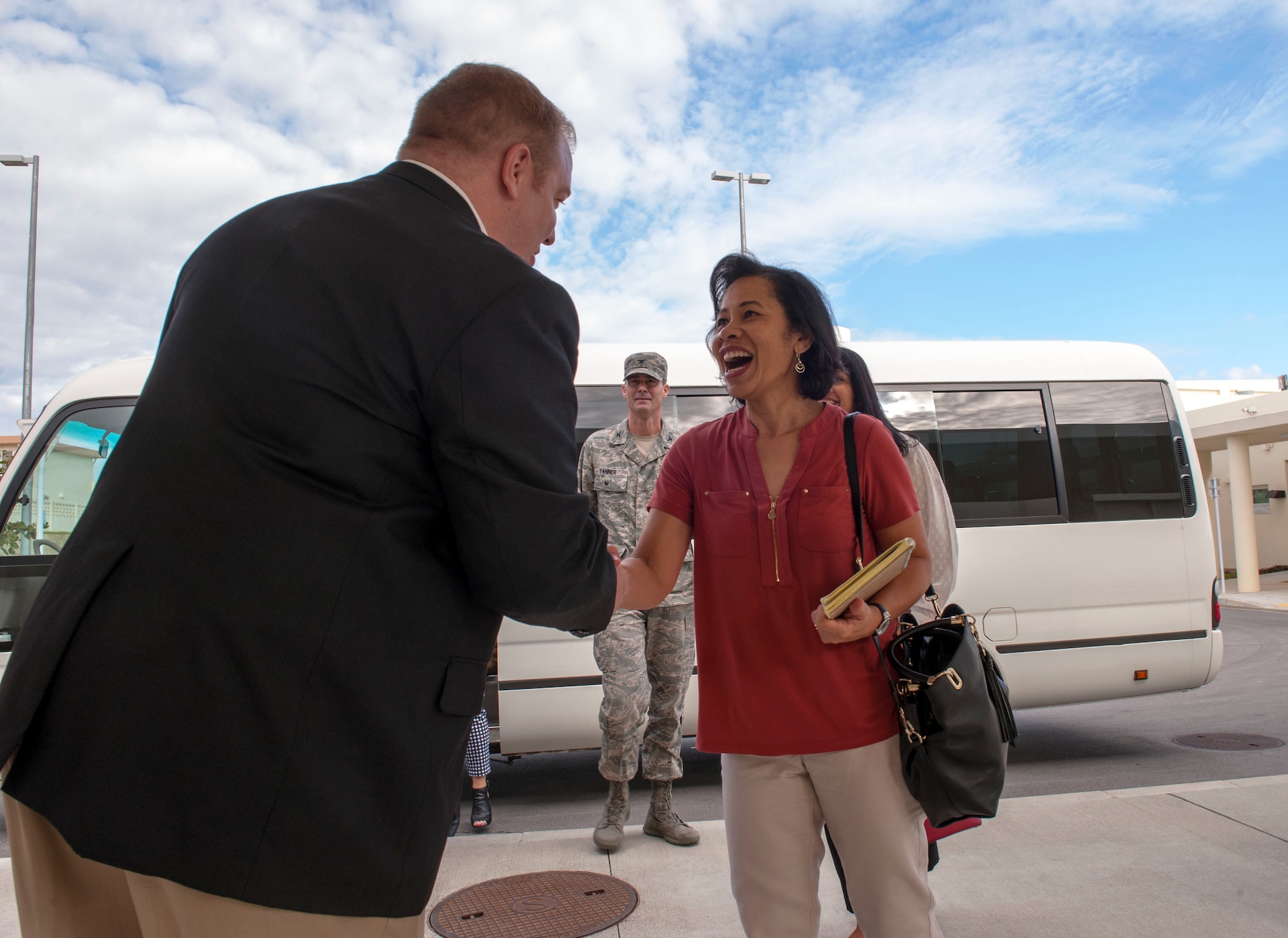 Sharene Brown, spouse of U.S. Air Force Gen. CQ Brown, Jr., Pacific Air Forces (PACAF) commander, greets Team Kadena spouses during the PACAF commander's visit at Kadena Air Base, Japan, Oct. 22, 2018. PACAF spouses and Team Kadena spouses talked about the challenges faced by military families on Okinawa. (U.S. Air Force photo by Naoto Anazawa)