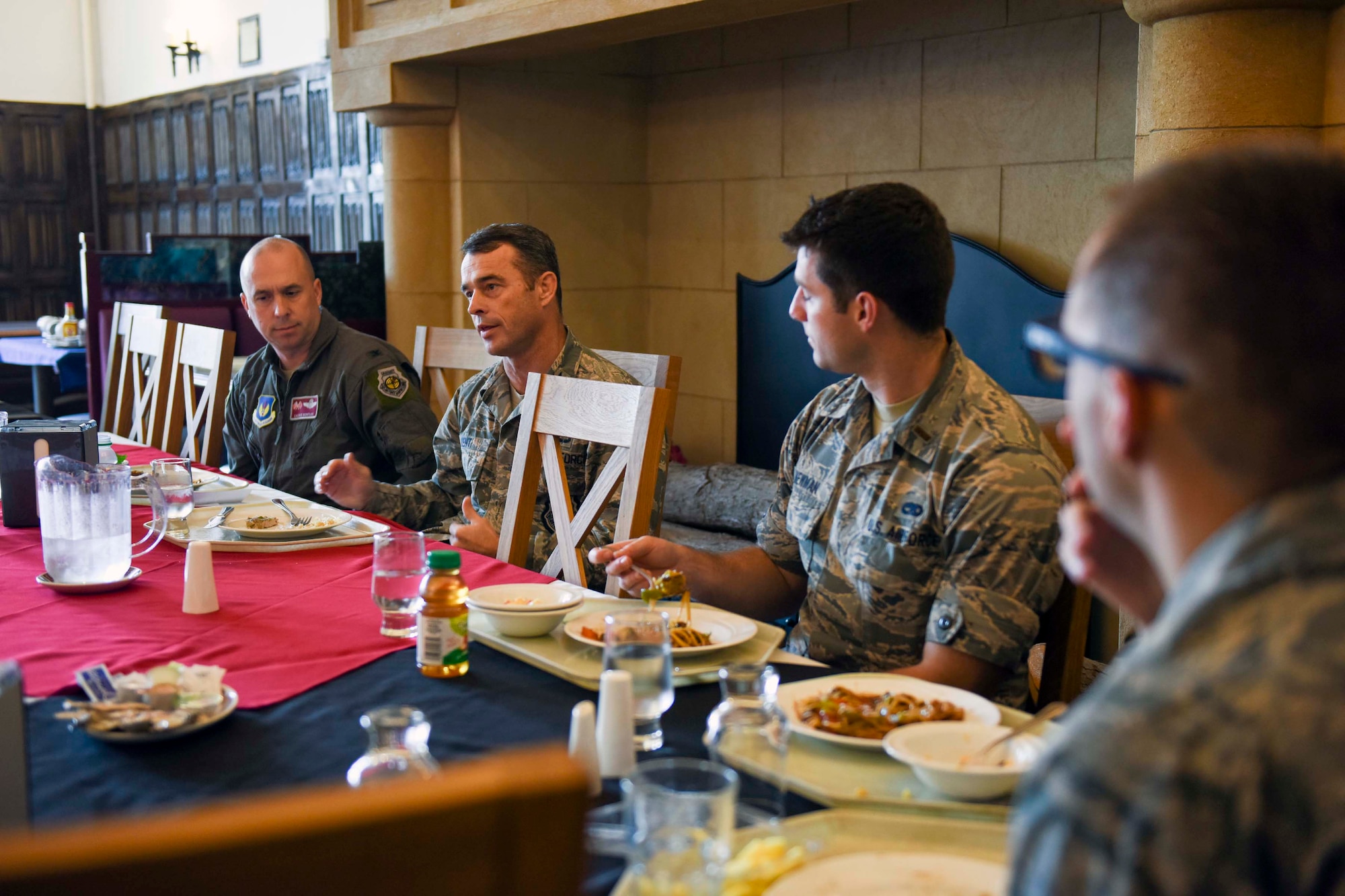 U.S. Air Force Col. John Kent, 48th Fighter Wing vice commander, speaks with flight commanders during a joint base flight commanders’ course lunch at RAF Mildenhall, England, Oct. 26, 2018. Both vice commanders from the 48th FW and 100th Air Refueling Wing answered questions from  flight or squadron commanders had. (U.S. Air Force photo by Staff Sgt. Christine Groening)