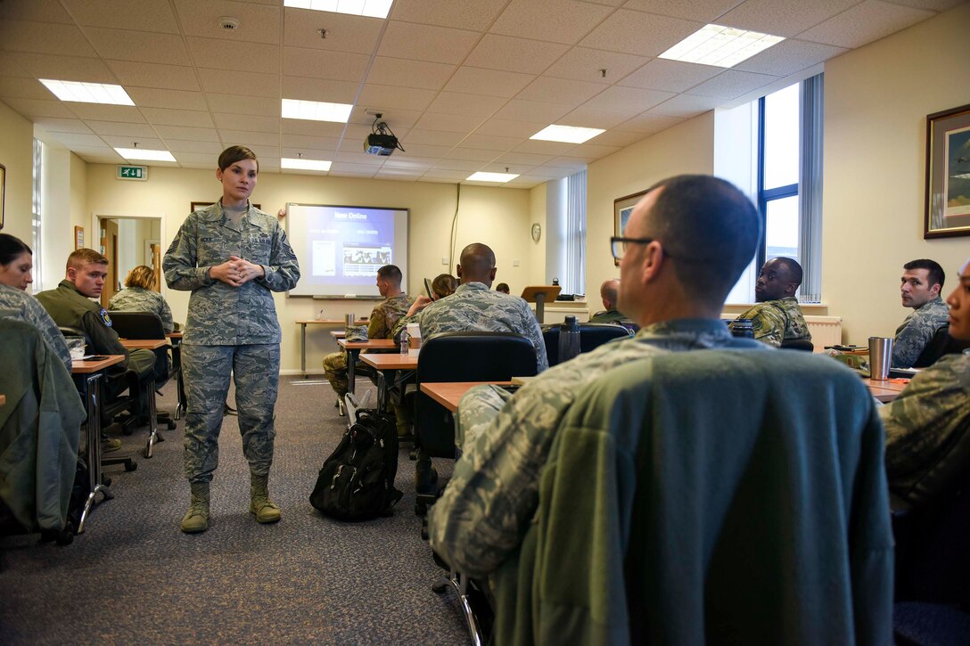 U.S. Air Force Senior Master Sgt. Nicole Hicks, 100th FSS Military Personnel Section superintendent, takes a question during a joint base flight commanders’ course at RAF Mildenhall, England, Oct. 26, 2018. Topics included time management, process improvement, writing, performance report, and rewards. (U.S. Air Force photo by Staff Sgt. Christine Groening)