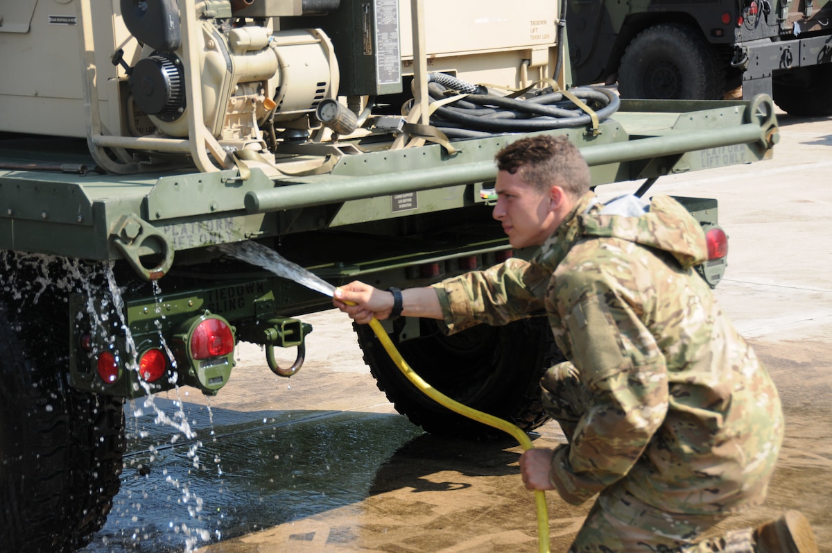 Soldier from 173rd Airborne Brigade utilize the Theater Logistic Support Center-Europe’s Deployment Processing Centers wash rack on Rhine Ordnance Barracks, June 5.