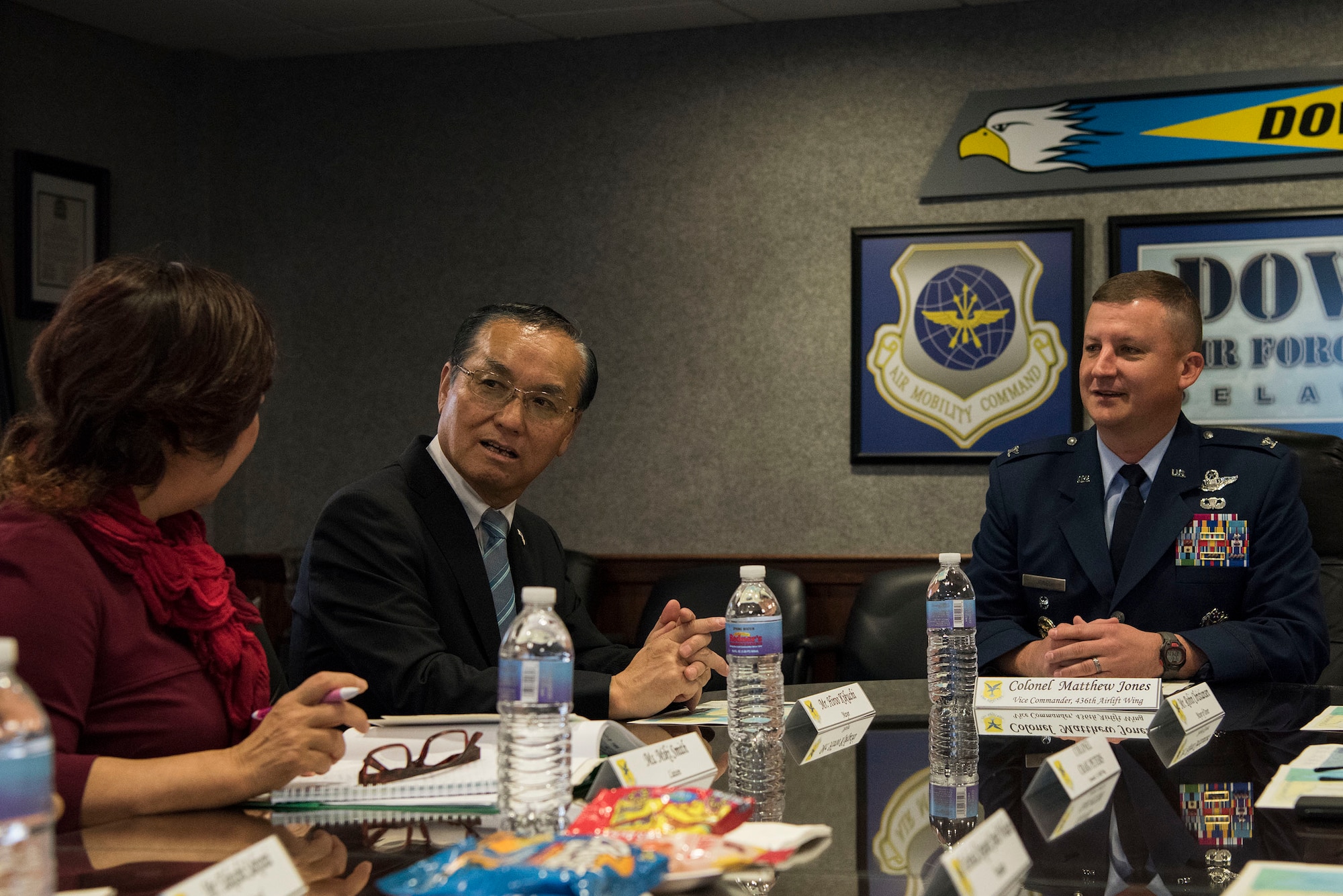 Hiroo Kikuchi, Iwanuma City mayor, and Col. Matthew Jones, 436th Airlift Wing vice commander, talk during a brief Oct. 23, 2018, at Dover Air Force Base, Del. Members from Iwanuma, Japan, met with 436th AW leadership for a tour of Dover AFB to exemplify the growing bond between the “sister cities”. (U.S. Air Force photo by Airman 1st Class Zoe M. Wockenfuss)