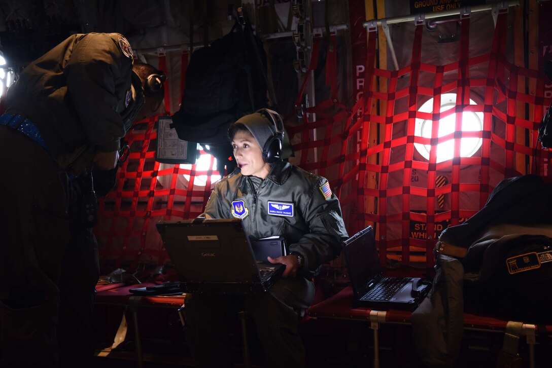 U.S. Air Force Maj. Maria Vazquez, 86th Aeromedical Evacuation Squadron medical crew director analyzes mission data on her laptop on a C-130J Super Hercules aircraft, Oct. 23, 2018. The 86th AES conducts readiness missions regularly to test preparedness and keep their skills up.