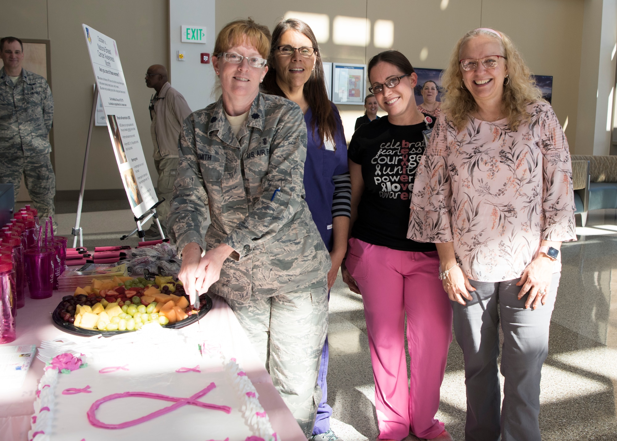(From left to right) Lt. Col. Debra Smith, 49th Medical Group women’s health element chief; Deborah Dolly, 49 MDG disease manager; Felicia Moore, 49 MDG disease manager; and Juli Bailey, 49 MDG health promotion coordinator, pose for a photo during the 49 MDG Breast Cancer Awareness Month Celebration October 25, 2018, at Holloman Air Force Base, N.M. October is Breast Cancer Awareness Month, and is dedicated to educating the public about breast cancer, how to prevent it and what treatments are available. (U.S. Air Force photo by Staff Sgt. BreeAnn Sachs)