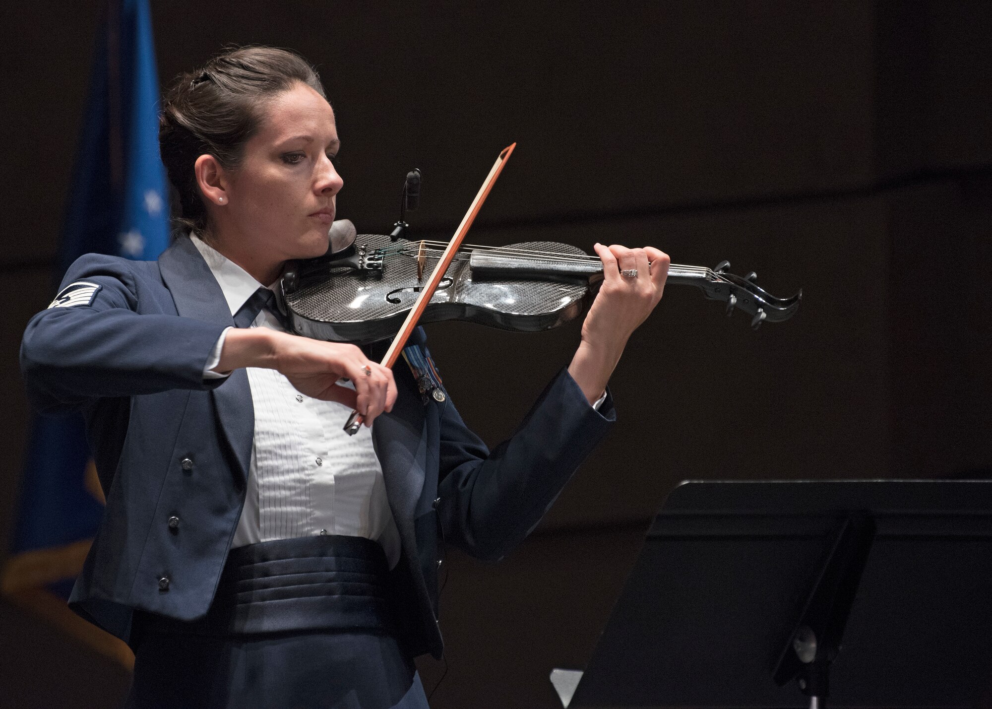 Master Sgt. Emily Wellington, U.S. Air Force Band’s Singing Sergeants vocalist and violinist, performs at the Wagner Noël Performing Arts Center in Midland, Texas, Oct. 21, 2018. The band aims to inspire patriotism and service, as well as honor veterans. (U.S. Air Force photo by Senior Airman Abby L. Richardson)