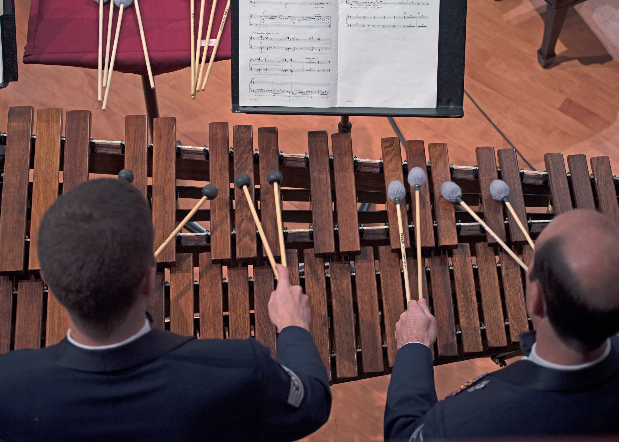 Tech. Sgt. Matt Penland, left, and Master Sgt. Marc Dinitz, right, U.S. Air Force Band percussionists, play the marimba during a performance at the University of North Texas in Denton, Texas, Oct. 25, 2018. The band performed in locations across New Mexico and Texas to inspire and engage the local communities. (U.S. Air Force photo by Senior Airman Abby L. Richardson)