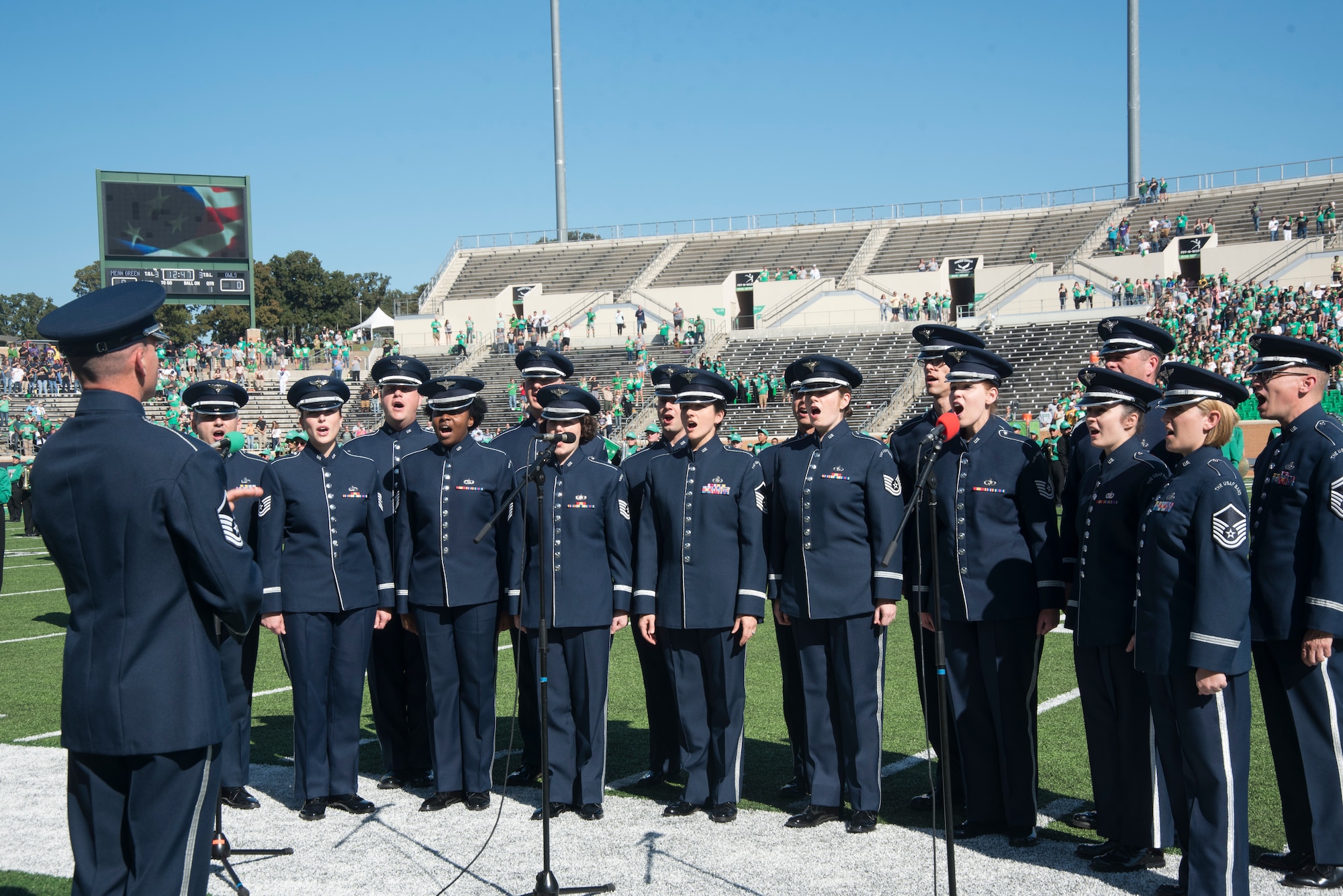 The U.S. Air Force Band’s Singing Sergeants perform the National Anthem before a University of North Texas football game at Apogee Stadium in Denton, Texas, Oct. 27, 2018. Band performances aim to positively impact the community and inspire patriotism. (U.S. Air Force photo by Senior Airman Abby L. Richardson)