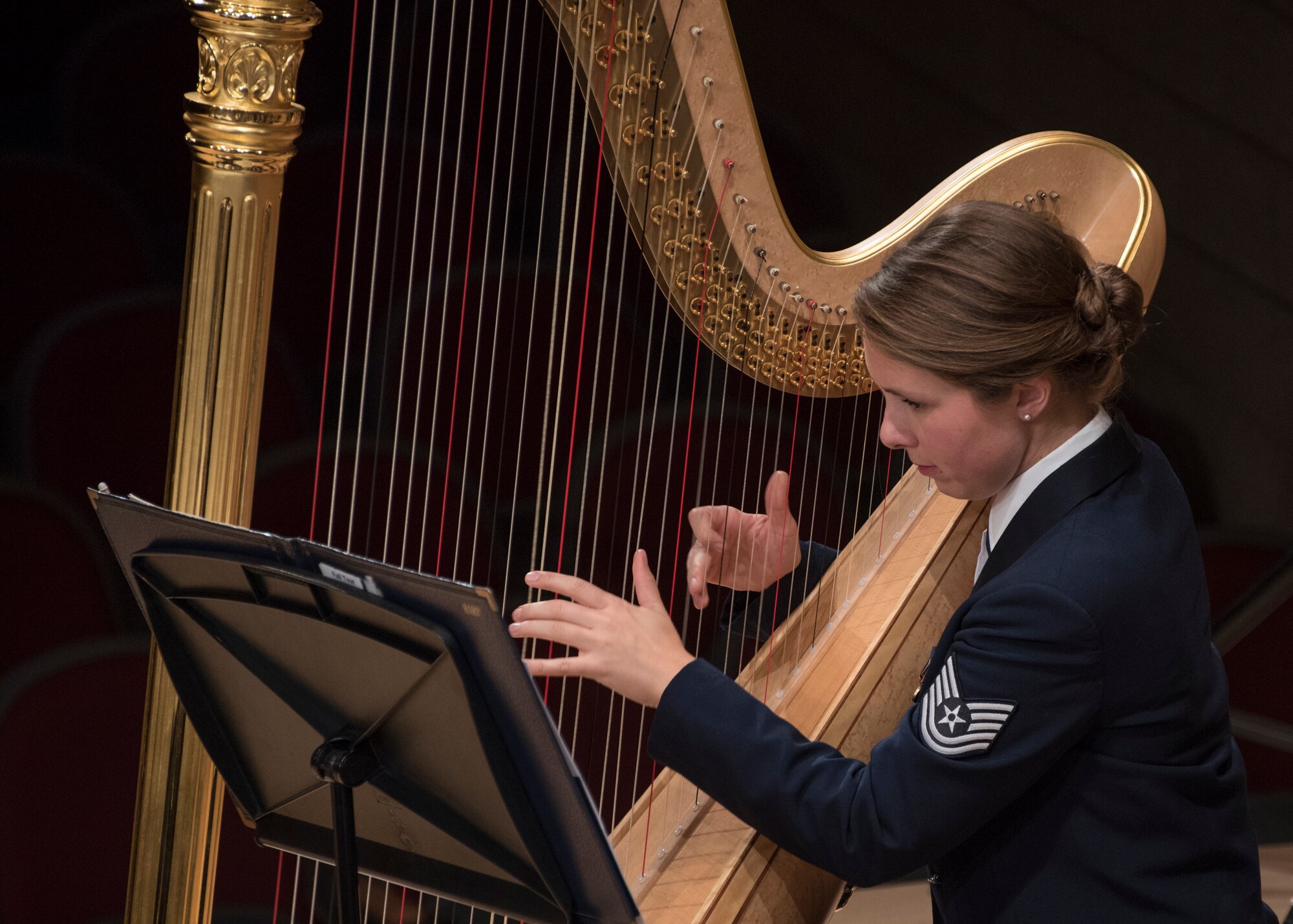 Tech. Sgt. Gréta Ásgeirsson, U.S. Air Force Band harpist, performs at the V. Sue Cleveland High Concert Hall in Rio Rancho, N.M., Oct. 17, 2018. The band performed in 12 locations across New Mexico and Texas. (U.S. Air Force photo by Senior Airman Abby L. Richardson)