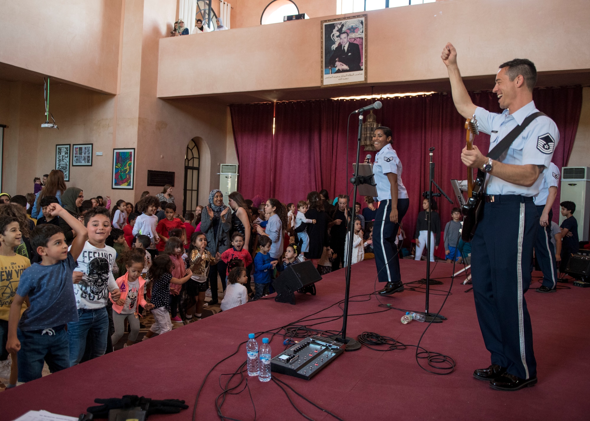 MARRAKECH, Morocco (Oct 23, 2018) Master Sergeant Johnny Kukan, USAFE-AFAFRICA Band Touch n’ Go NCOIC/guitarist, performs at The American School of Marrakesh. The band, in Morocco to support the African Air Chiefs Symposium and the Marrakech Air Show, also had the opportunity to perform for nearly 400 students. The aviation events and band performances highlighted the strong cooperation and partnership between the U.S. and Morocco and demonstrates U.S. commitment to safety and security across Africa.  (DoD photo by Mass Communication Specialist 2nd Class Cody Hendrix)
