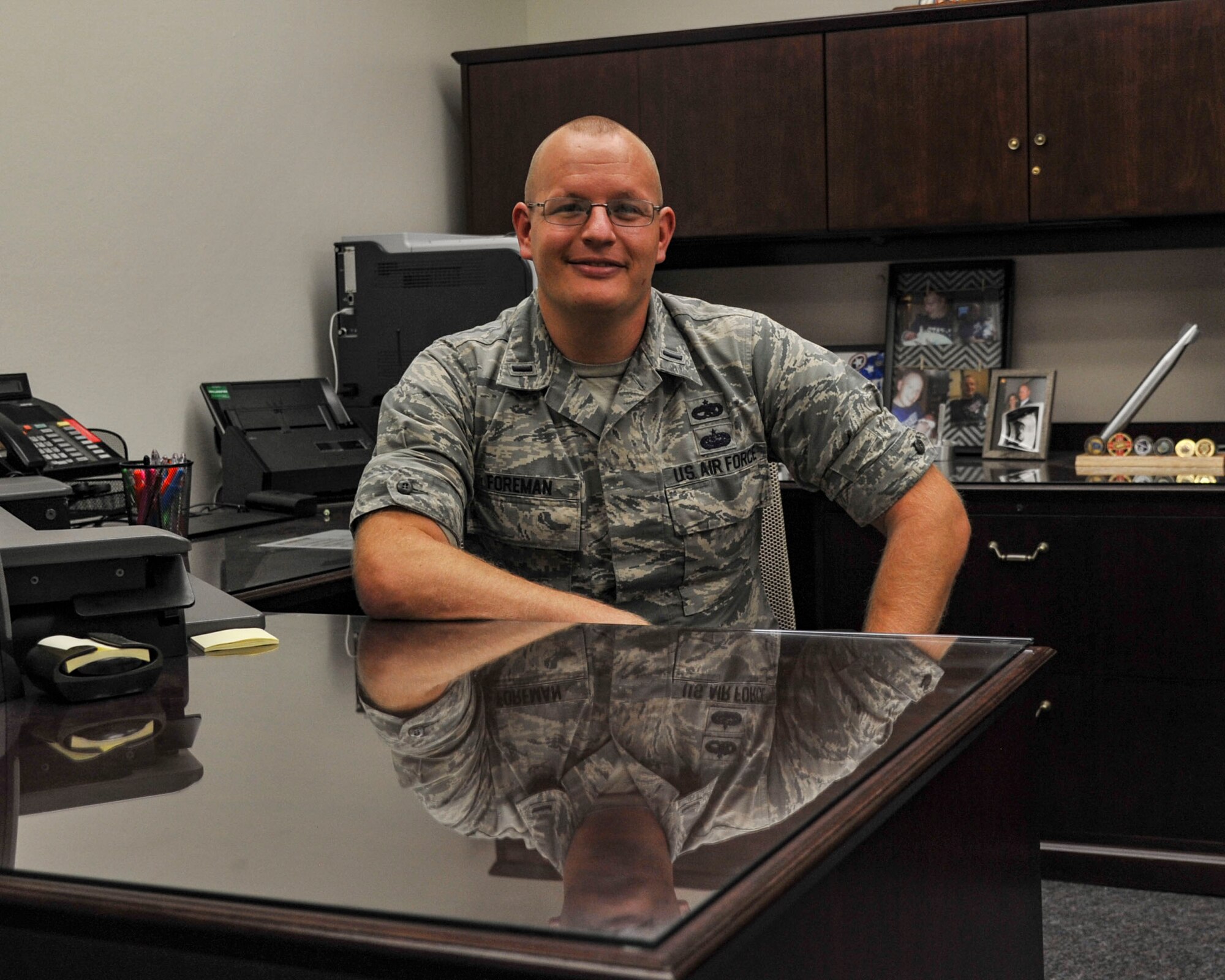 1st Lt Joseph Foreman at his work station at the 377th Maintenance Group. (U.S. Air Force photo by Jim Fisher)
