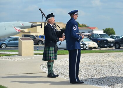 During the Twenty-Fifth Air Force Remembrance Ceremony at Joint Base San Antonio-Lackland Sept. 28, E.W. Forbess plays amazing grace. Each year, former and present members of Twenty-Fifth Air Force, friends and collogues gather to remember the year’s fallen silent warriors.