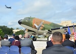 During the Twenty-Fifth Air Force’s Remembrance Ceremony at Joint Base San Antonio-Lackland Sept. 28, a C-5 aircraft from the 433rd Airlift Wing flies over while U.S. Air Force Maj. Gen. Mary O’Brien, Twenty-Fifth Air Force commander, speaks about the organization’s losses during its 70 Years in the Fight.