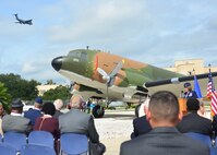 During the Twenty-Fifth Air Force’s Remembrance Ceremony at Joint Base San Antonio-Lackland Sept. 28, a C-5 aircraft from the 433rd Airlift Wing flies over while U.S. Air Force Maj. Gen. Mary O’Brien, Twenty-Fifth Air Force commander, speaks about the organization’s losses during its 70 Years in the Fight.