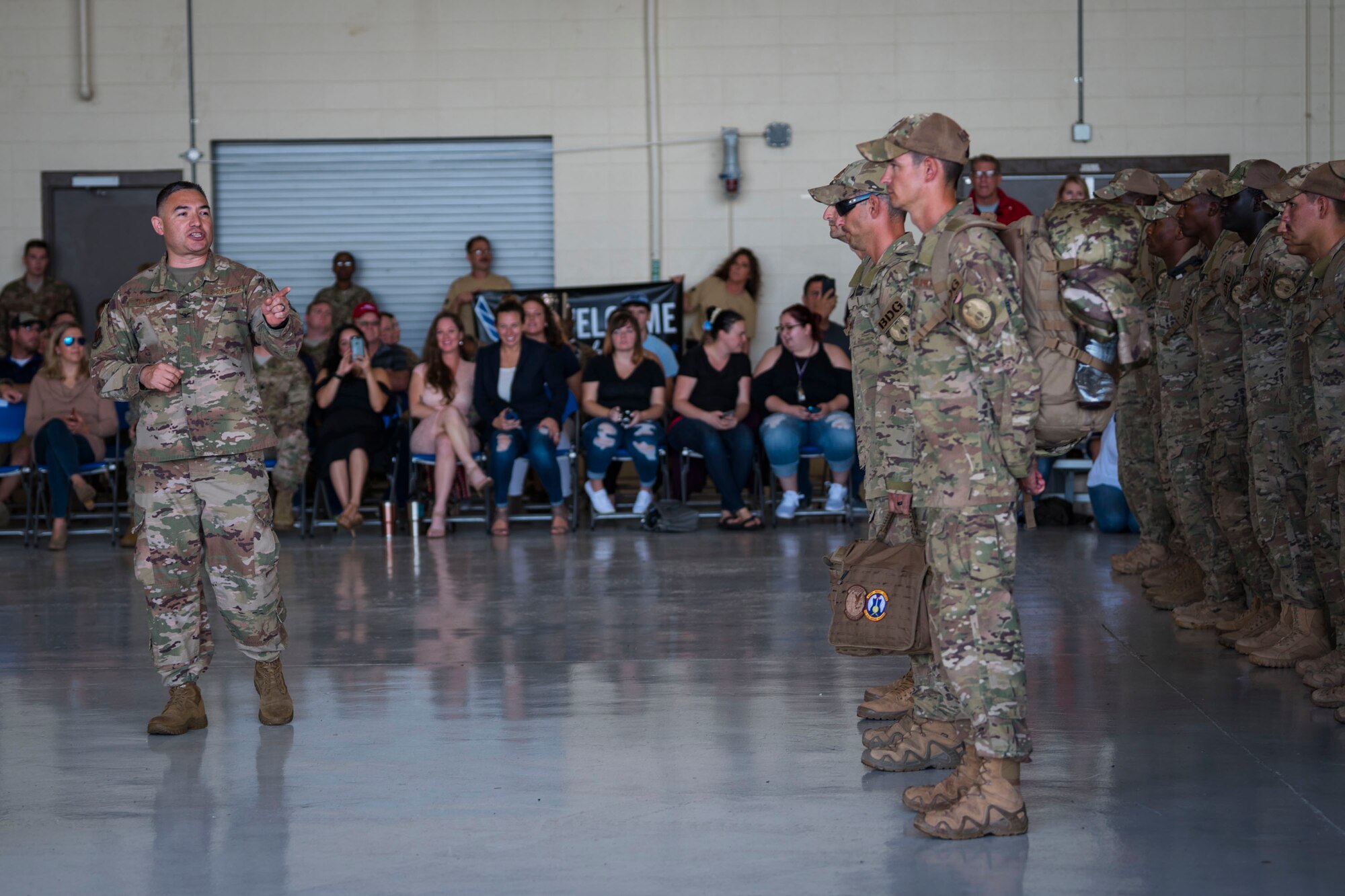 Col. Benito Barron, 820th Base Defense Group commander, addresses the 823d Base Defense Squadron (BDS) flight on their accomplishments during a redeployment ceremony, Oct. 26, 2018, at Moody Air Force Base, Ga. The 822d, 823d and 824th BDS’s provide high-risk force protection and integrated base defense for expeditionary air forces. Airmen from the 823d BDS just returned home from conducting relief-in-place in the United States Africa Command theater while Airmen from the 824th BDS took their place. (U.S. Air Force photo by Airman Taryn Butler)