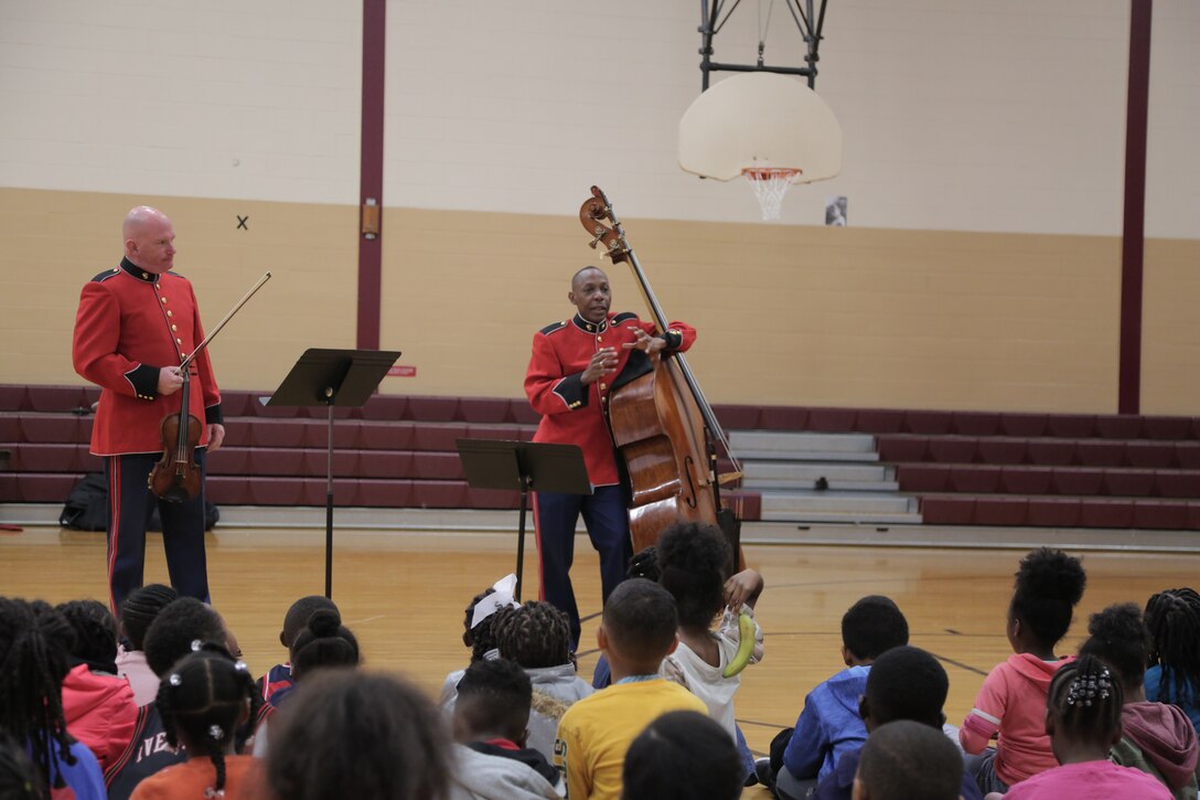 On Oct. 25, 2018, a string duo from "The President's Own" U.S. Marine Band presented a Music in the Schools program at the Benjamin D. Foulois Creative and Performing Arts Academy in Suitland, Md. (U.S. Marine Corps photo by Master Sgt. Kristin duBois/released)