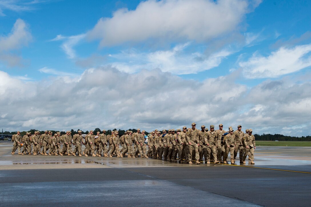 The 823d Base Defense Squadron (BDS) march on the flightline during a redeployment, Oct. 26, 2017, at Moody Air Force Base, Ga. The 822d, 823d and 824th BDS’s provide high-risk force protection and integrated base defense for expeditionary air forces. Airmen from the 823d BDS just returned home from conducting relief-in-place in the United States Africa Command theater while Airmen from the 824th BDS took their place. (U.S. Air Force photo by Senior Airman Janiqua P. Robinson)