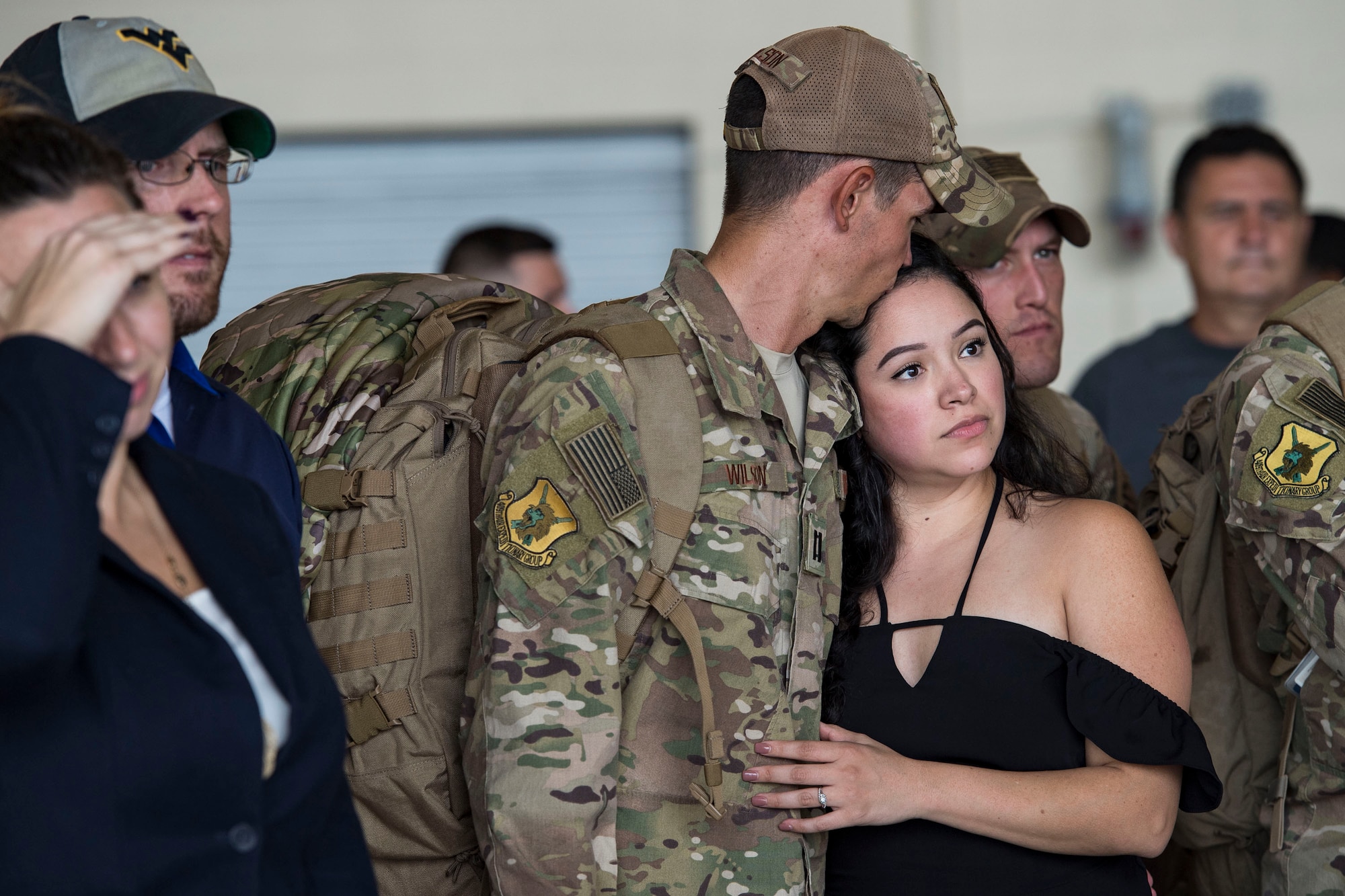 Capt. Justin Wilson 823d Base Defense Squadron (BDS), embraces a loved one during a redeployment, Oct. 26, 2017, at Moody Air Force Base, Ga. The 822d, 823d and 824th BDS’s provide high-risk force protection and integrated base defense for expeditionary air forces. Airmen from the 823d BDS just returned home from conducting relief-in-place in the United States Africa Command theater while Airmen from the 824th BDS took their place. (U.S. Air Force photo by Senior Airman Janiqua P. Robinson)