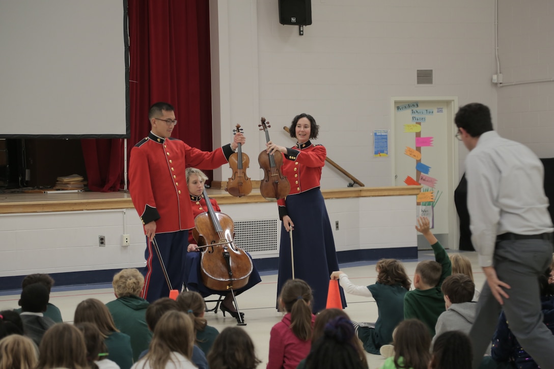 On Oct. 17, 2018, a string quartet from "The President's Own" U.S. Marine Band performed a Music in the Schools program at Brent Elementary School in Washington, D.C. (U.S. Marine Corps photo by Master Sgt. Kristin duBois/released)