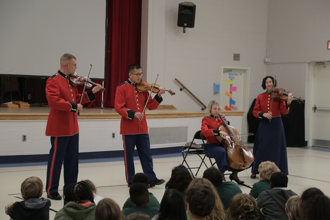 On Oct. 17, 2018, a string quartet from "The President's Own" U.S. Marine Band performed a Music in the Schools program at Brent Elementary School in Washington, D.C. (U.S. Marine Corps photo by Master Sgt. Kristin duBois/released)