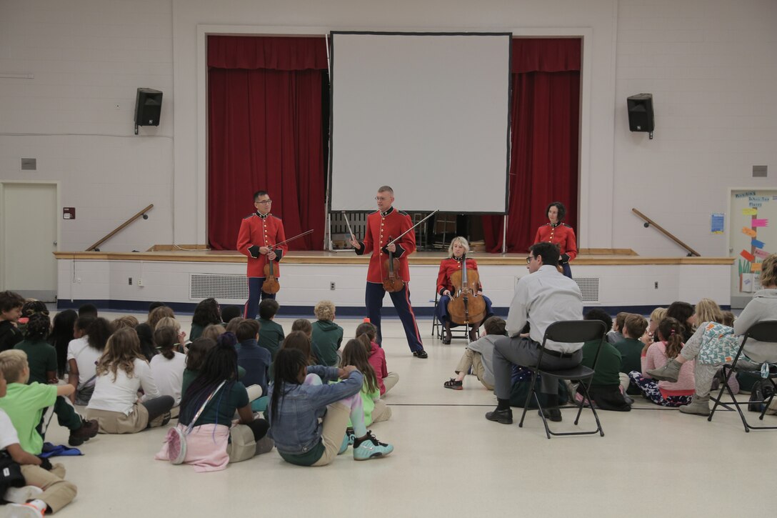 On Oct. 17, 2018, a string quartet from "The President's Own" U.S. Marine Band performed a Music in the Schools program at Brent Elementary School in Washington, D.C. (U.S. Marine Corps photo by Master Sgt. Kristin duBois/released)