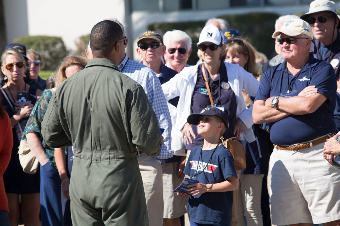 1st Lt. Charles Jordan, an MV-22B Osprey pilot with VMM-162, explains the capabilities of the MV-22B to members of the U.S. Naval Academy Alumni Association at Marine Corps Air Station Miramar, Calif., Oct. 26. Members of the U.S. Naval Academy Alumni Association visited MCAS Miramar to get an idea of what it’s like to be stationed at MCAS Miramar (U.S. Marine Corps photo by Sgt. Jake McClung)